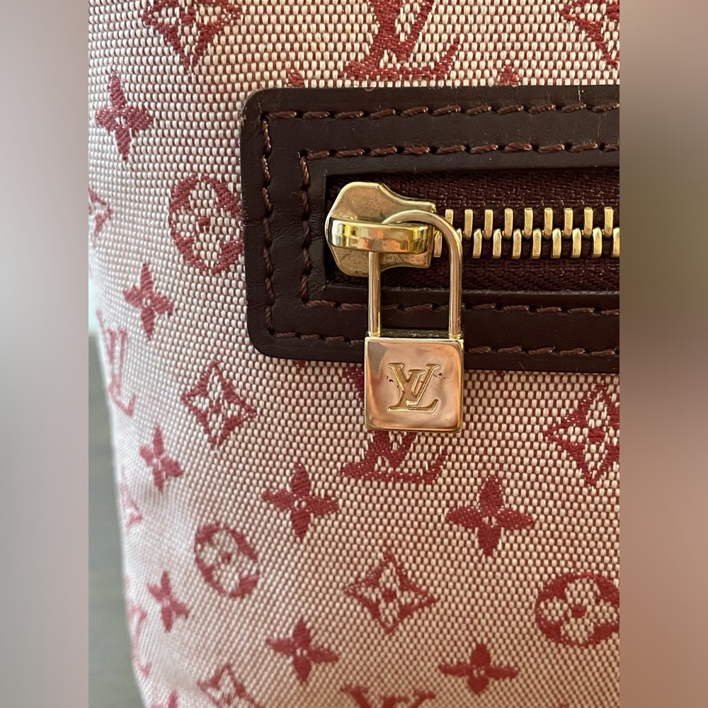 LOUIS VUITTON
Cherry Red Monogram Mini Lin Lucille PM TST Bag